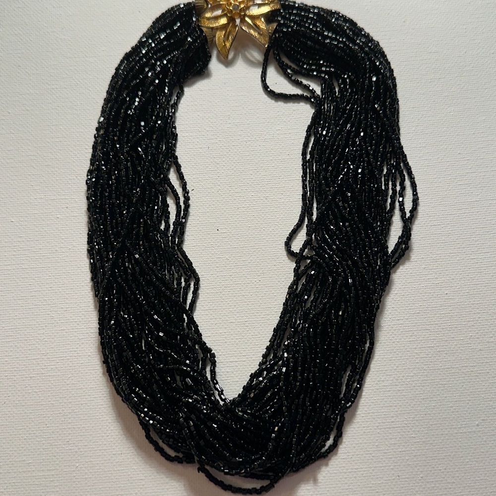 Vintage Elegant Black Beaded Necklace with Gold Accent Flower